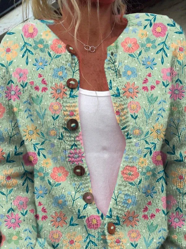 Sommerlig cardigan med blomsterprint og knapper